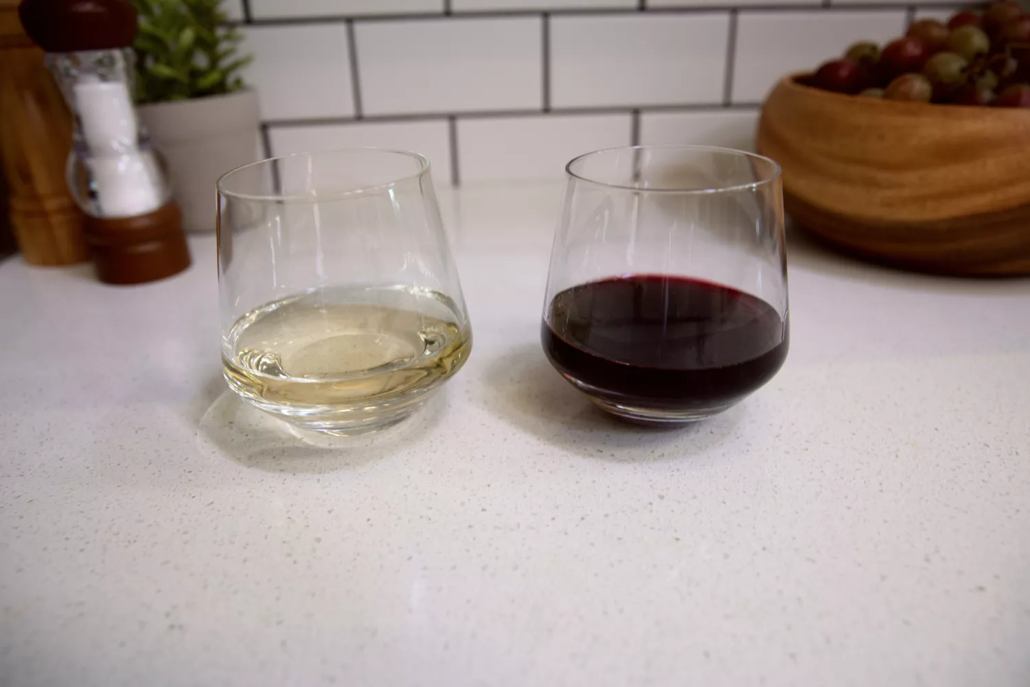 A pair of Zwiesel Glas Schott Zwiesel Tritan Crystal Glass Pure Barware Collection Stemless Burgundy Red Wine Glass