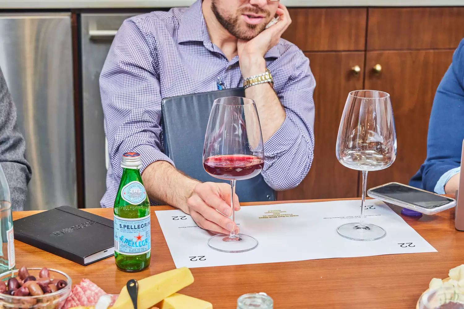 A person looking into Made In Red Wine Glasses placed on table during testing